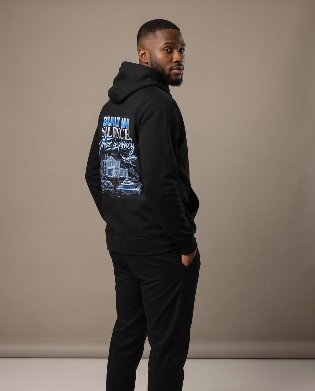 Build In Silence Hoodie in black worn by a male model, front view
