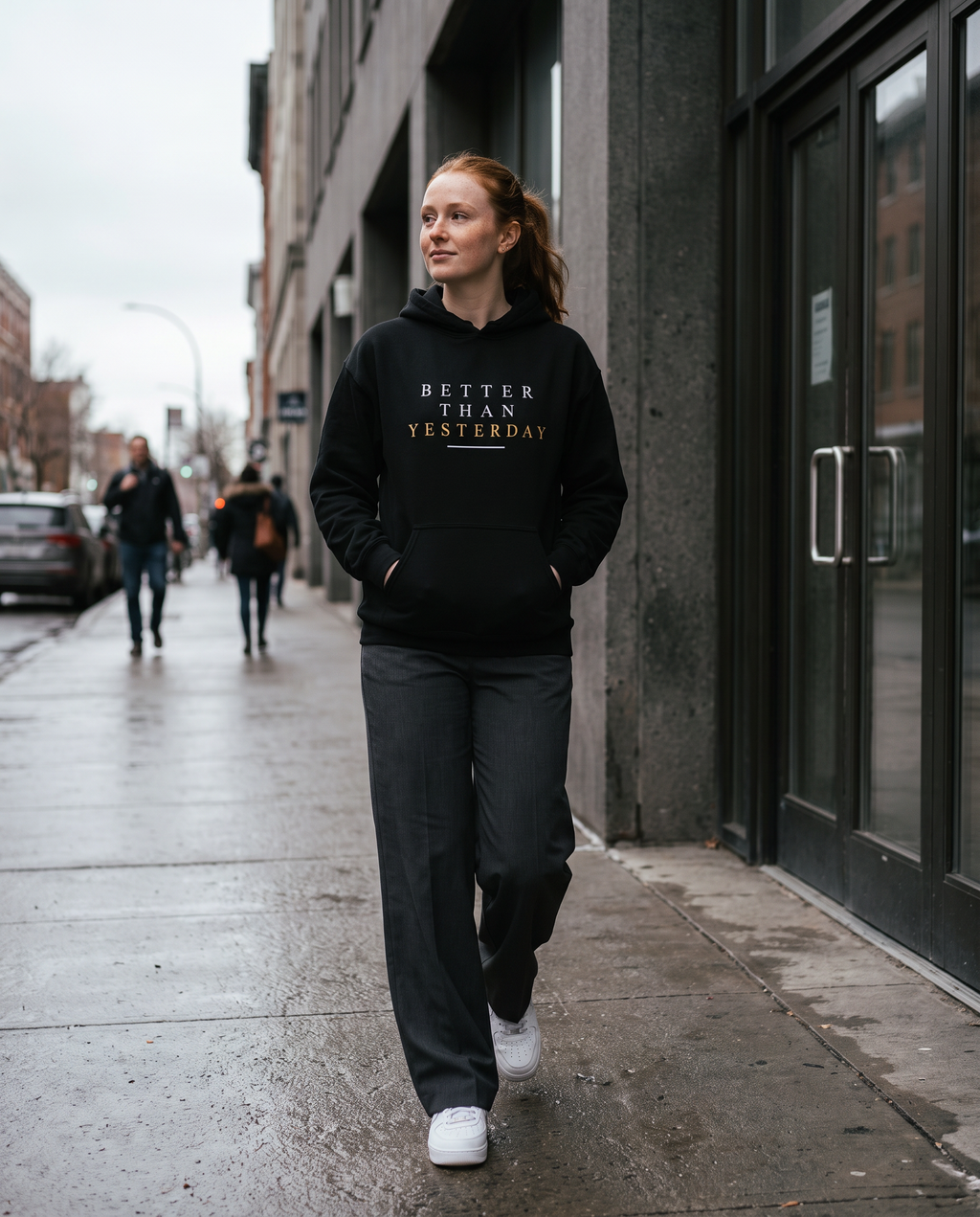 Model wearing the Landells Better Hoodie, street style walking