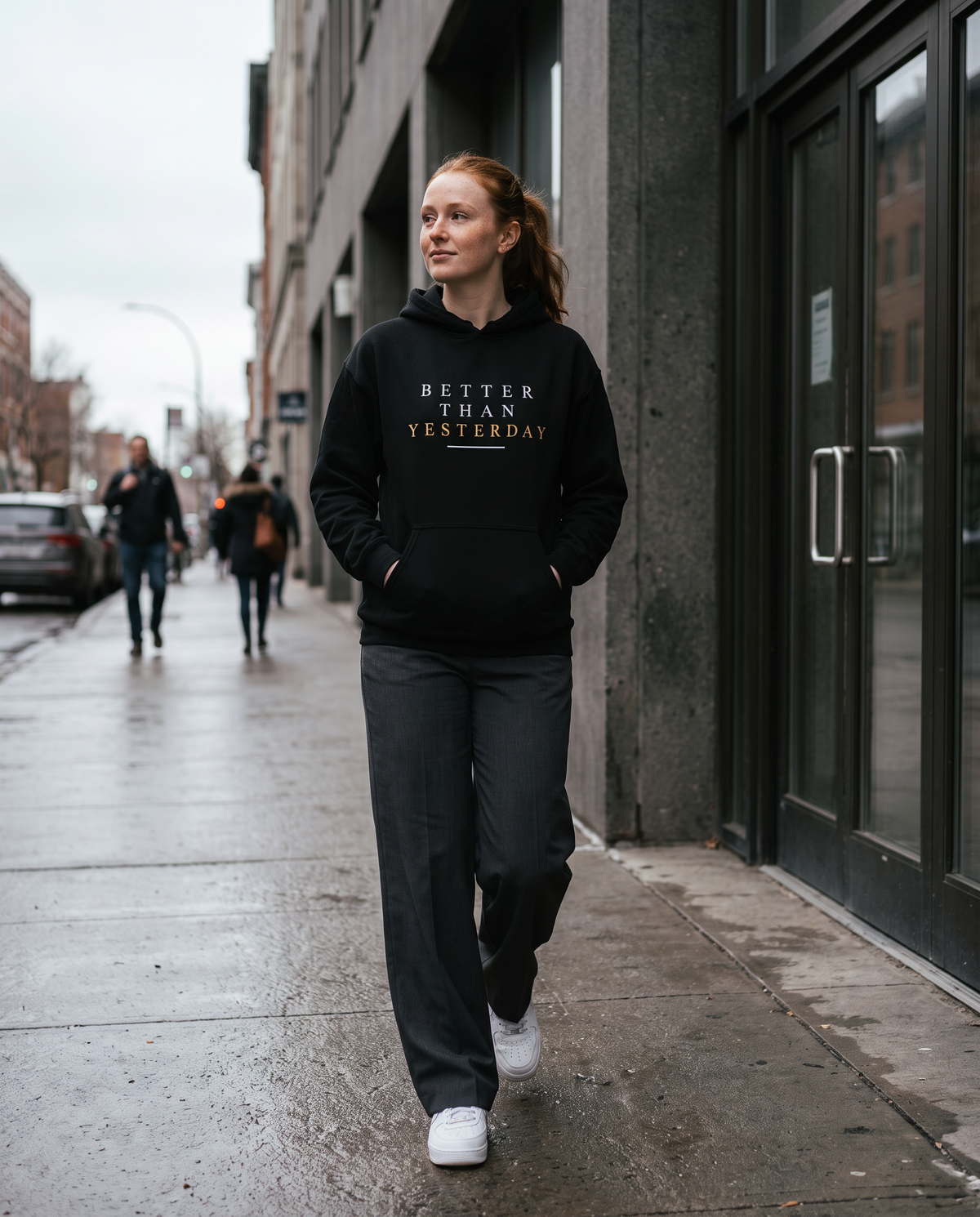Model wearing the Landells Better Hoodie, street style walking