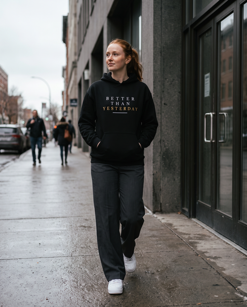 Model wearing the Landells Better Hoodie, street style walking