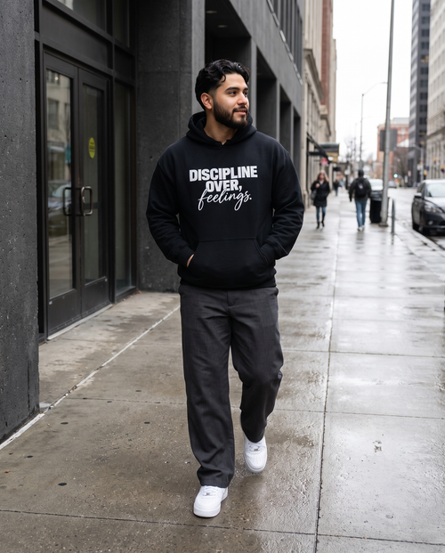 Model wearing the Landells Discipline Hoodie, street style walking