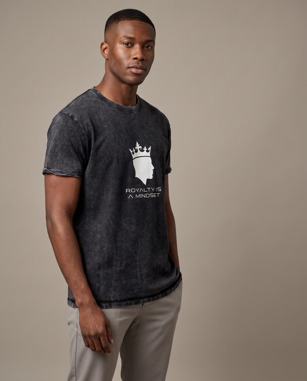 Model wearing the Landells Denim Tee in black, studio three-quarter front view