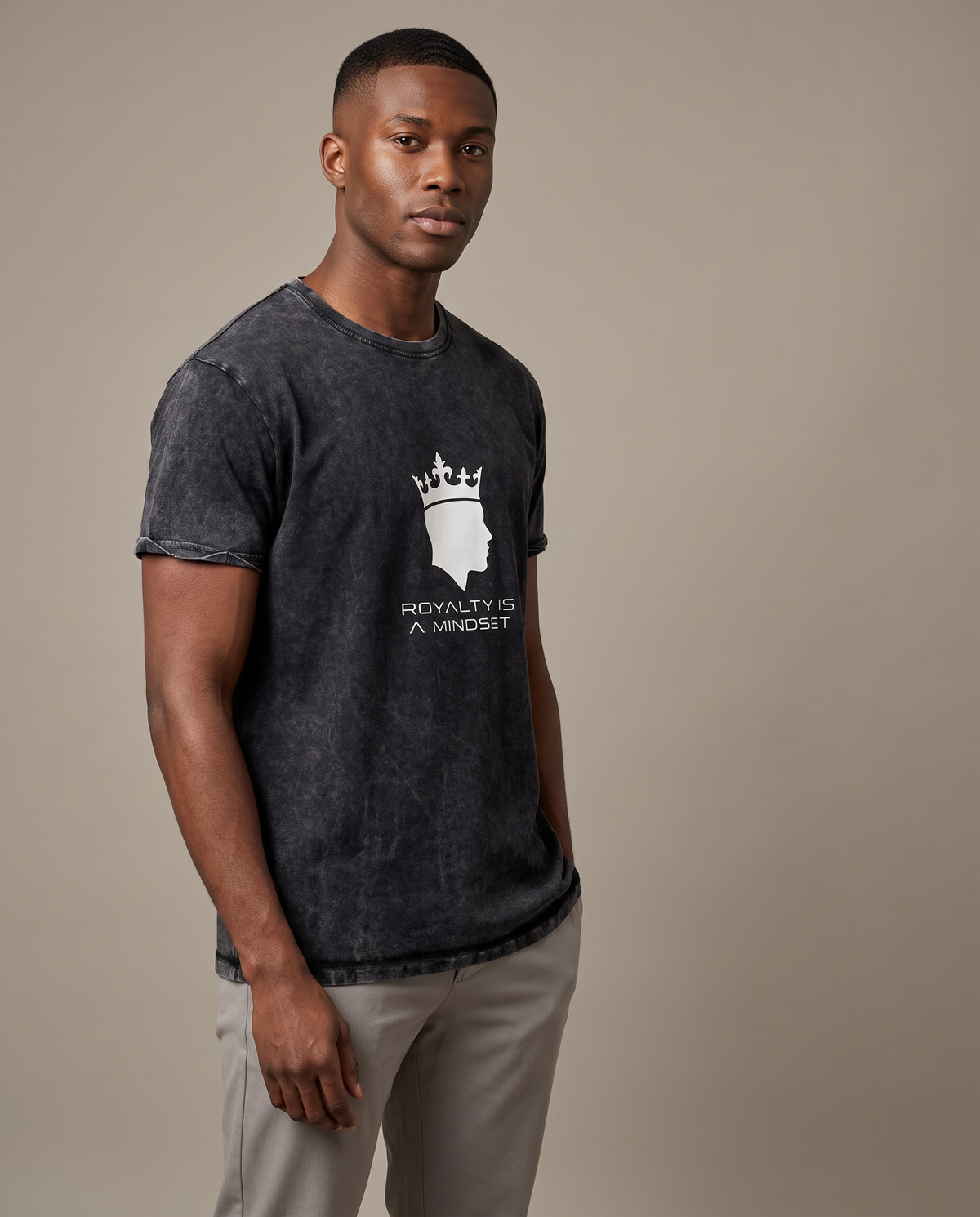 Model wearing the Landells Denim Tee in black, studio three-quarter front view