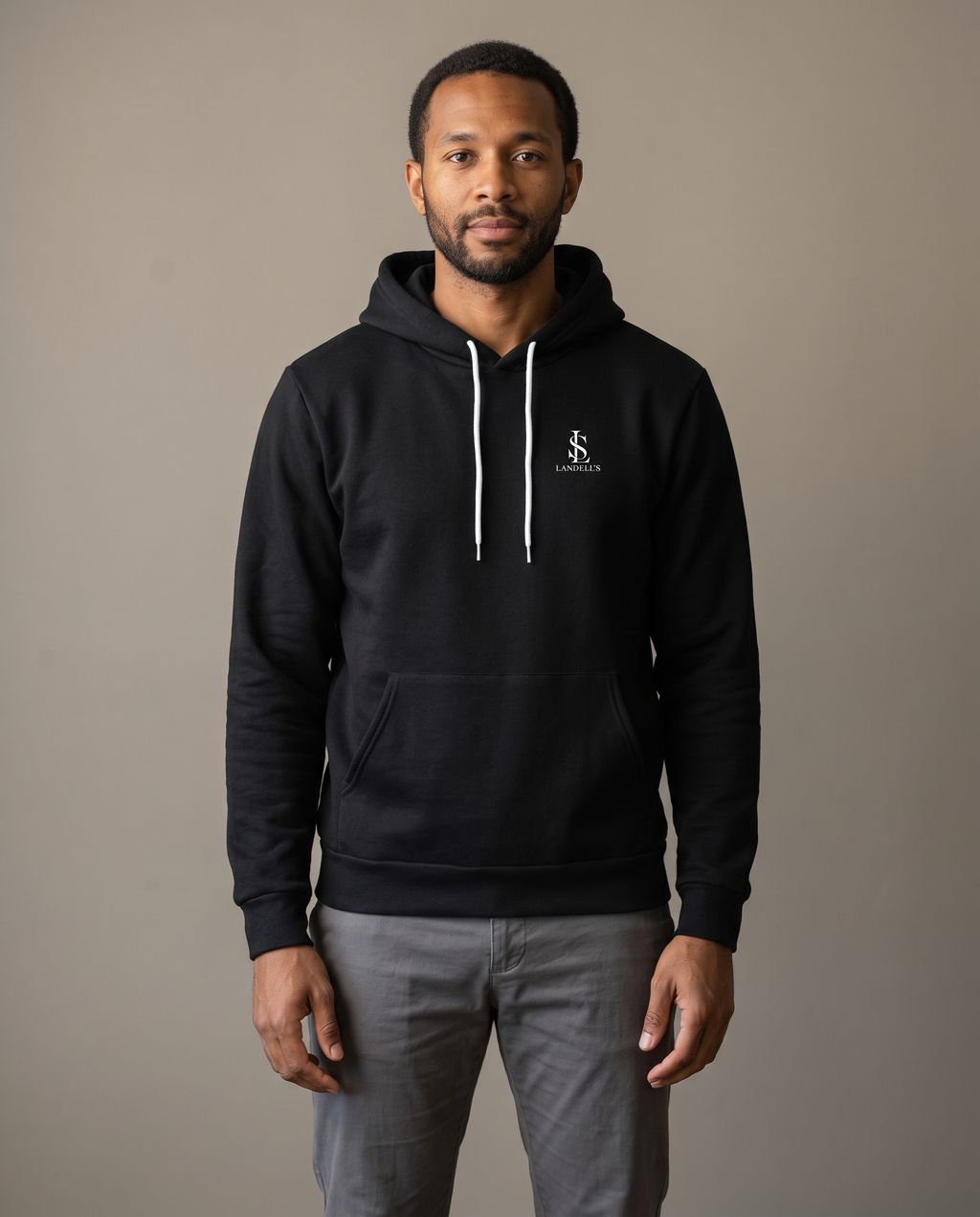 Model wearing the Landells Legacy Hoodie, studio front view