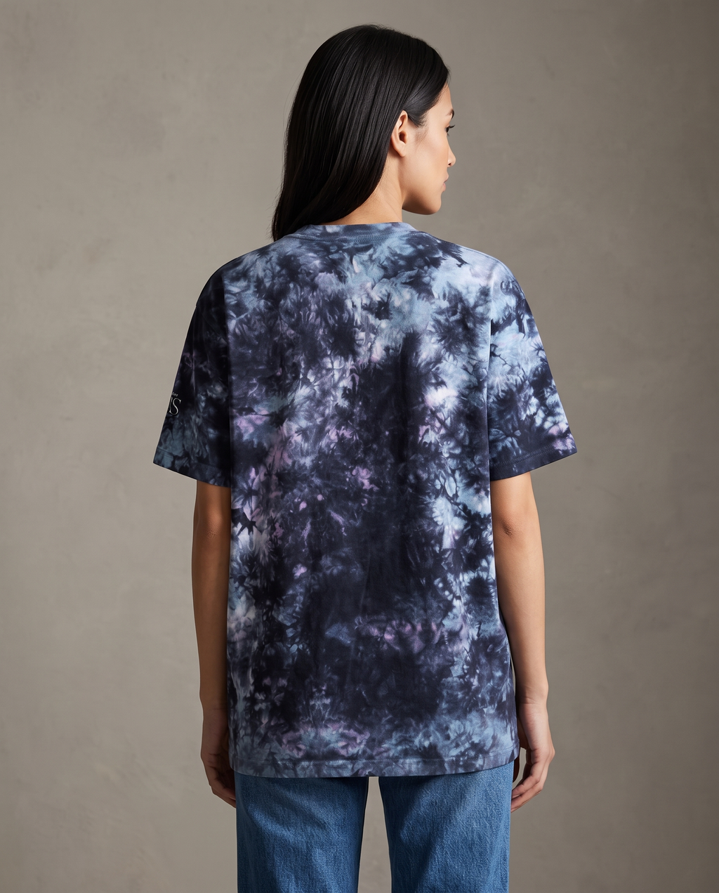 Back view of the tie-dye tee on model