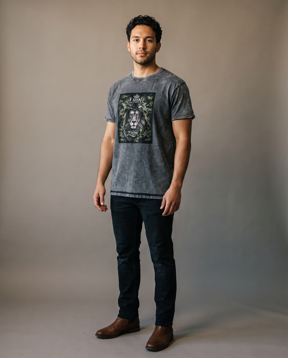 Man wearing the Lion From Zion acid-wash denim tee, studio