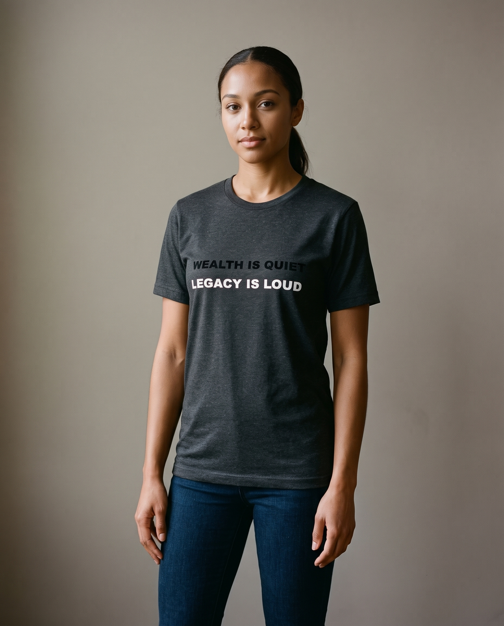 Woman wearing the Landells Heritage Tee with jeans, studio