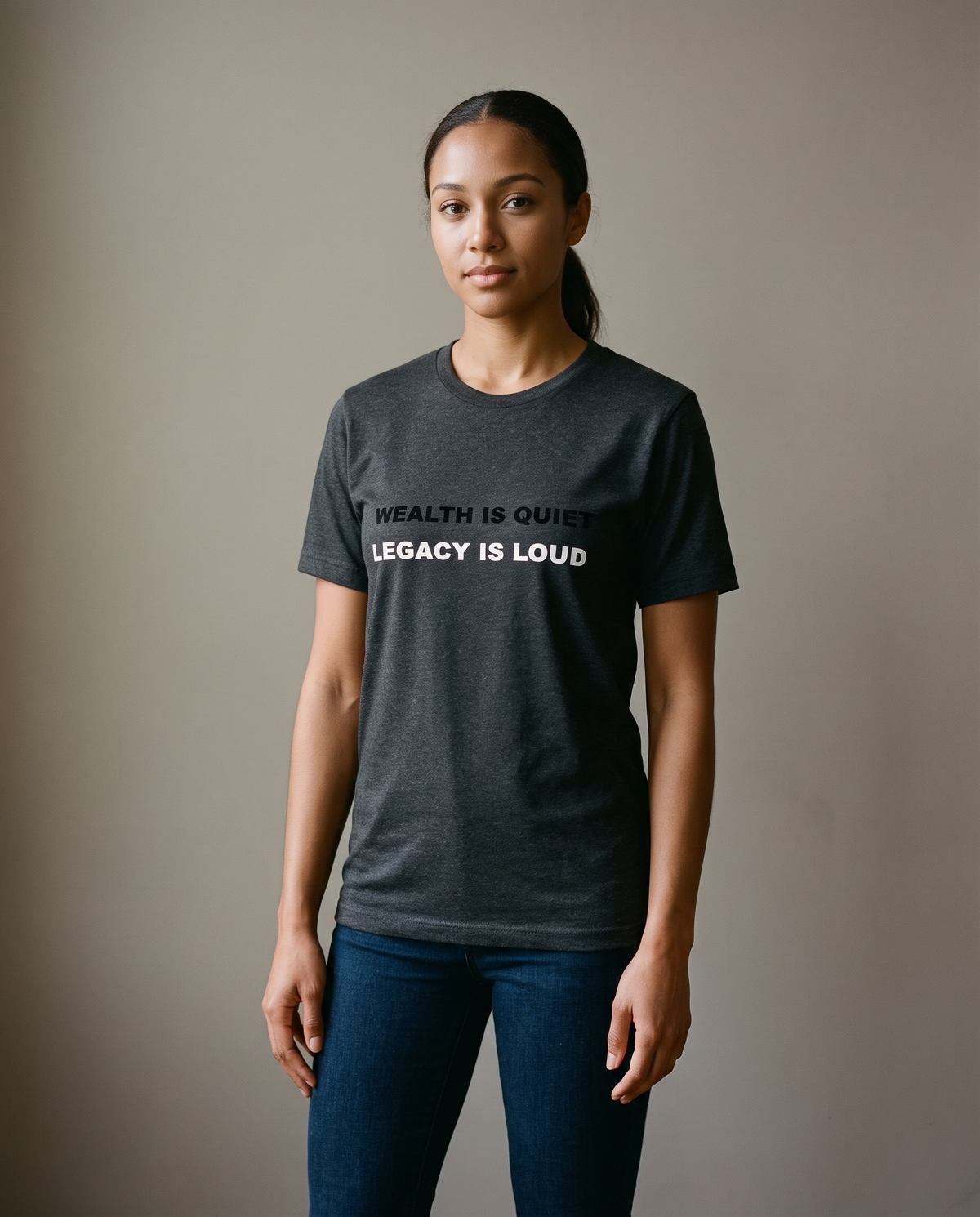 Woman wearing the Landells Heritage Tee with jeans, studio